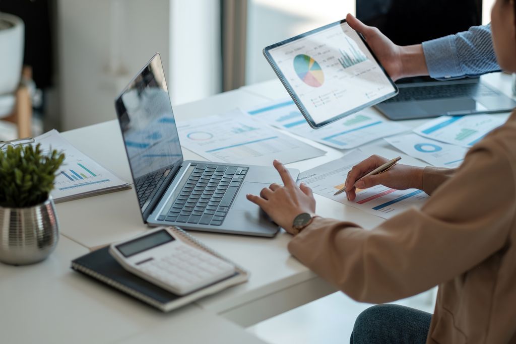 Business people are meeting for analysis data figures to plan business strategies. Business discussing concept calcul chiffre d'affaire